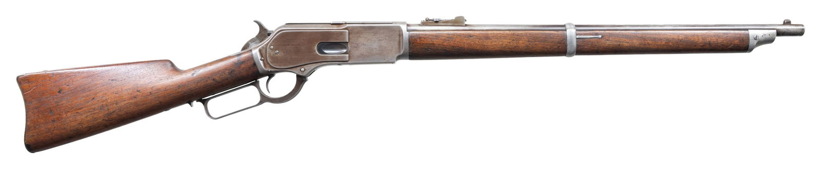 NORTH WEST MOUNTED POLICE MARKED WINCHESTER MODEL: 1876 LEVER ACTION SADDLE RING CARBINE. Cal. 45-75. S# 44153. Bbl. 22" rnd. with integral front sight and 200-1000 yard leaf rear sight. Action has saddle ring on left side. Full length band fastened