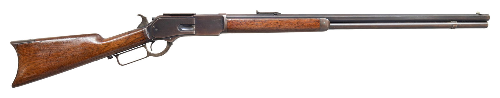 WINCHESTER EARLY 2ND MODEL 1876 LEVER ACTION: RIFLE. Cal. 45-75 WCF. S#.6983. Bbl. 28" octagon. Sporting front with graduated leaf rear sight. Full length mag. A very late early style 2nd model rifle featuring a thumb print dust cover on a screw