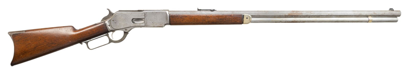 WINCHESTER 1876 LEVER ACTION RIFLE.: Cal. 45-60. S# 25118. Bbl unmarked 31" octagon replacement with handstamped caliber marking. Bead front sight with graduated leaf rear sight. Full length mag. Walnut forearm, straight grip stock with