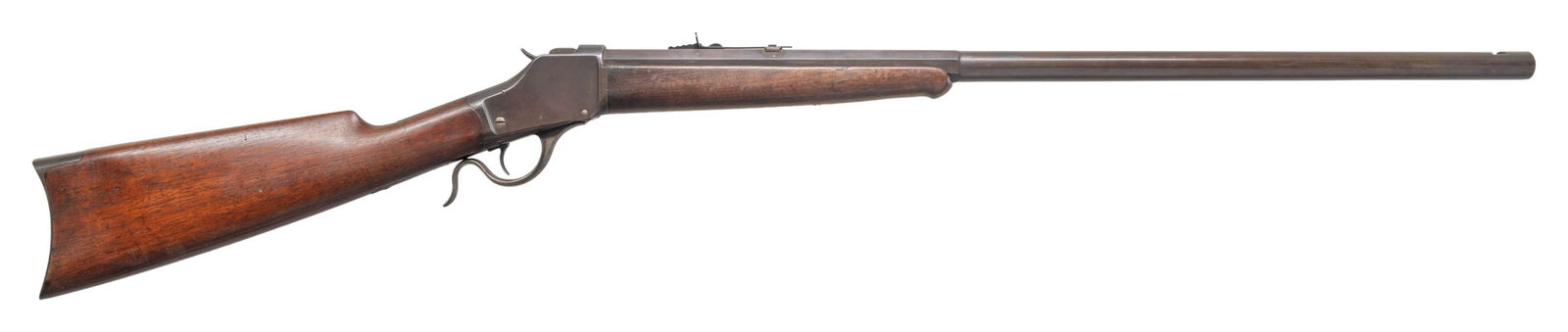 EARLY WINCHESTER MODEL 1885 HIGH WALL SINGLE SHOT: BREECHLOADING RIFLE. Cal. 32-40. S# 8680. Bbl. 27 7/8". Model 1885 High Wall single shot breechloading rifle mfg. by Winchester in 1887. Top flat of the half octagonal bbl. is marked with Winchester's