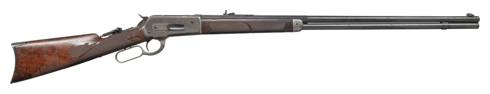 WINCHESTER MODEL 1886 ENGRAVED LEVER ACTION RIFLE.: Cal. 45-90 WCF. S# 118351. Bbl. 30" octagon to round, 4" longer than standard. Left bbl. flat is engraved "Special from W. F. Sheard, Tacoma, Wash." Brass bead Sheard hunting front sight and elevator