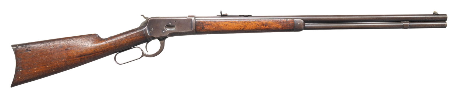 WINCHESTER 1892 LEVER ACTION RIFLE.: Cal. 44 WCF. S# 35488. Bbl 24" rnd with sporting sights. Full length mag. Forearm and straight grip walnut stock with crescent steel buttplate. Mfg. 1893. CONDITION: metal has faded to brown showing s