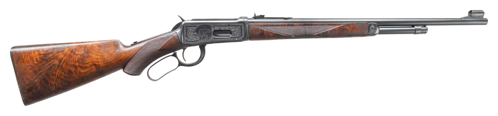 NICK KUSMIT CUSTOM ENGRAVED WINCHESTER MODEL 64: LEVER ACTION RIFLE. Cal. 30 WCF. S# 1147835. Bbl. 20". Model 64 lever action rifle mfg. by Winchester in 1938. Left side of the bbl. is marked with the model and cal. designations, with Winchester's m