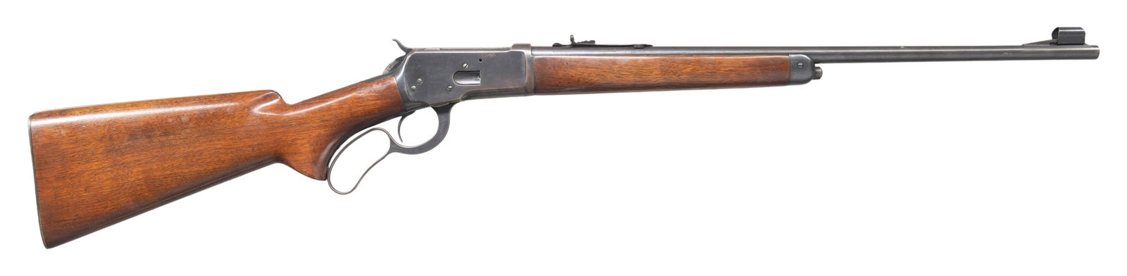 WINCHESTER 65 LEVER ACTION RIFLE.: Cal. 25-20 WCF. S# 1007271. Bbl. 22" with hooded stippled ramp beaded front sight. Elevator adjustable sporting rear sight. Uncheckered pistol grip walnut stock set with checkered steel shotgun buttpl
