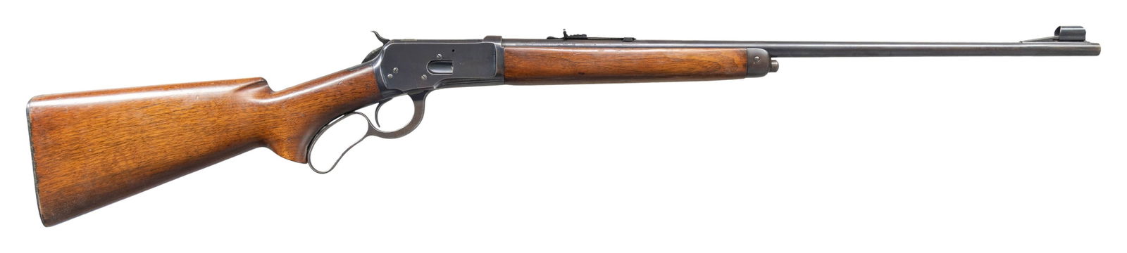 WINCHESTER 65 LEVER ACTION RIFLE.: Cal. 218 Bee. S# 1005078. Bbl. 24" hooded with stippled ramp beaded front sight. Elevator adjustable sporting rear sight. Uncheckered pistol grip stock with checkered steel shotgun buttplate and steel