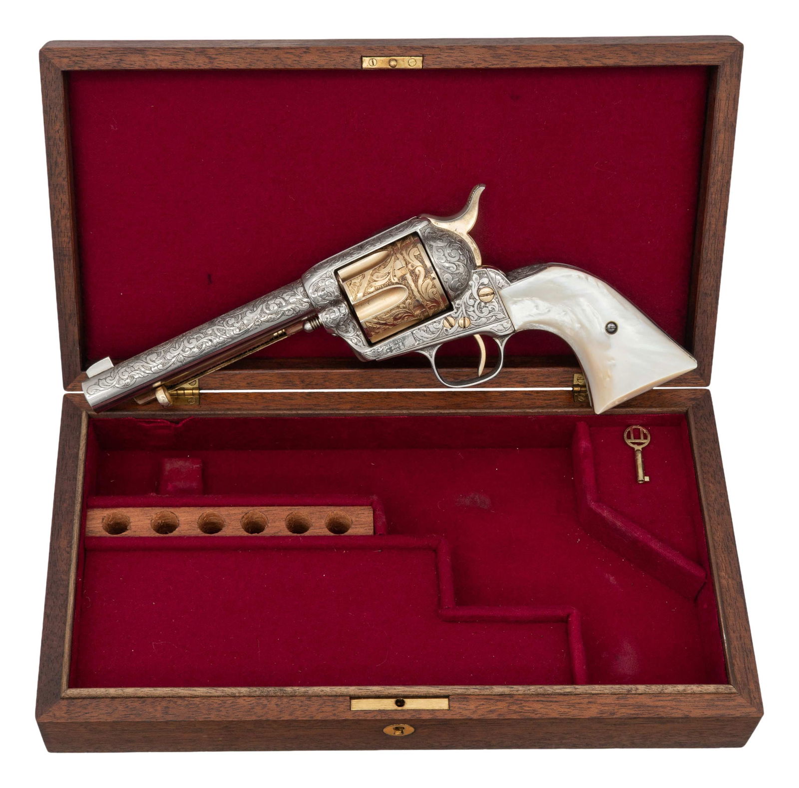 CUSTOM ENGRAVED U.S. COLT SINGLE ACTION ARMY: REVOLVER. Cal. 22. S# 55061. Bbl. 5 1/2". Single Action Army revolver originally mfg. by Colt under contract for the U.S. Government. Bbl. is unmarked. Left side of the black powder frame retains trac