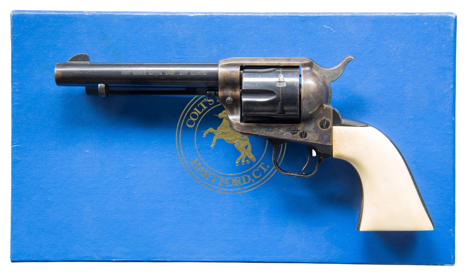 SECOND GENERATION COLT SINGLE ACTION ARMY REVOLVER: WITH FACTORY BOX. Cal. 357 Magnum. S# 66882SA. Bbl. 5 1/2". Second Generation Single Action Army revolver mfg. by Colt in 1973. Left side of the bbl. is marked "COLT SINGLE ACTION ARMY .357 MAGNUM",