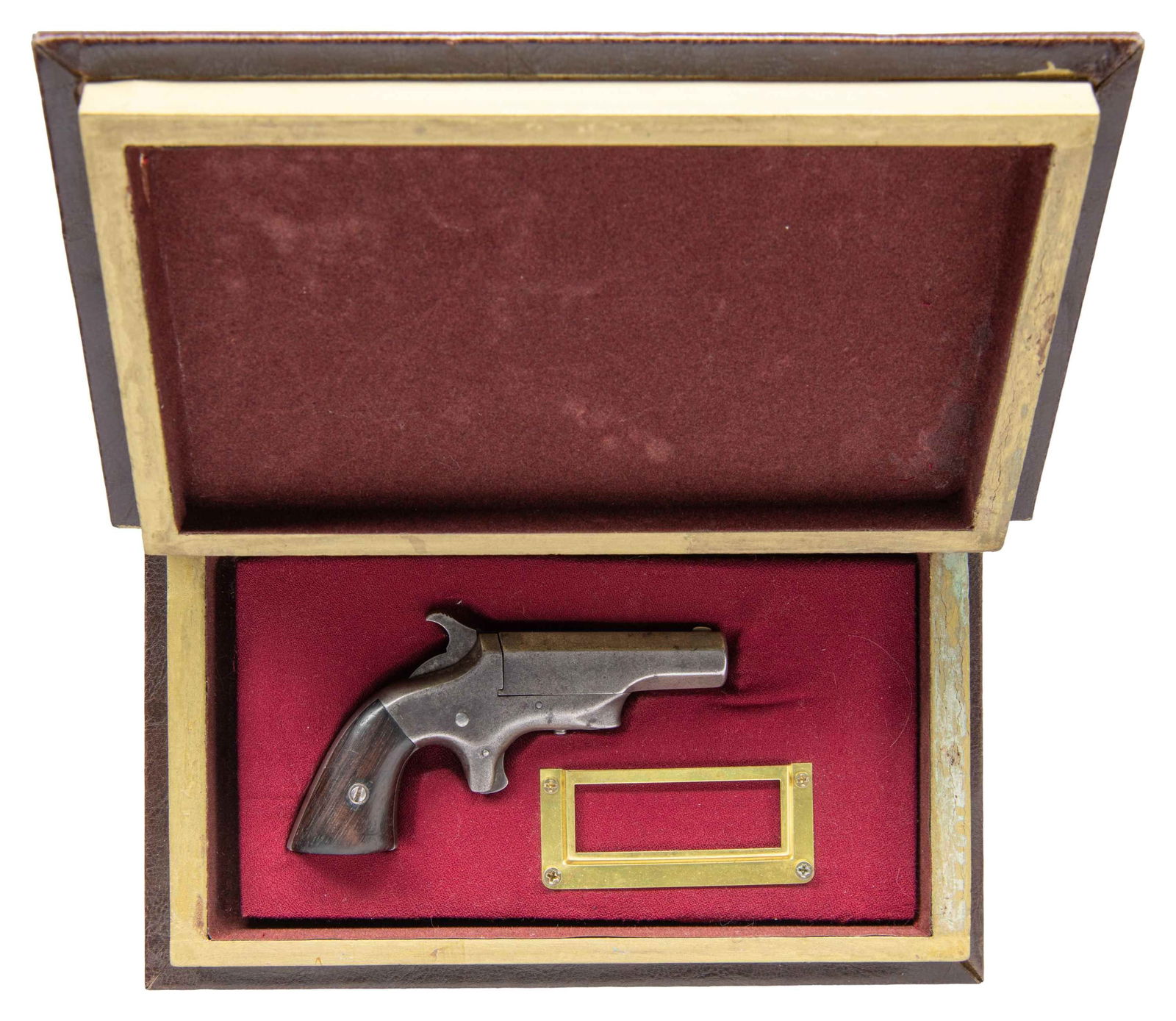 BROWN MFG. CO. SOUTHERNER DERRINGER.: Cal. 41 RF. S# 9524. Approx. 6,500 mfg. Late 1860's - 1870's. Pivoting 2.5" barrel with worn out patent markings & "SOUTHERNER" on top flat. Iron frame with spur trigger & 2 piece square butt walnut