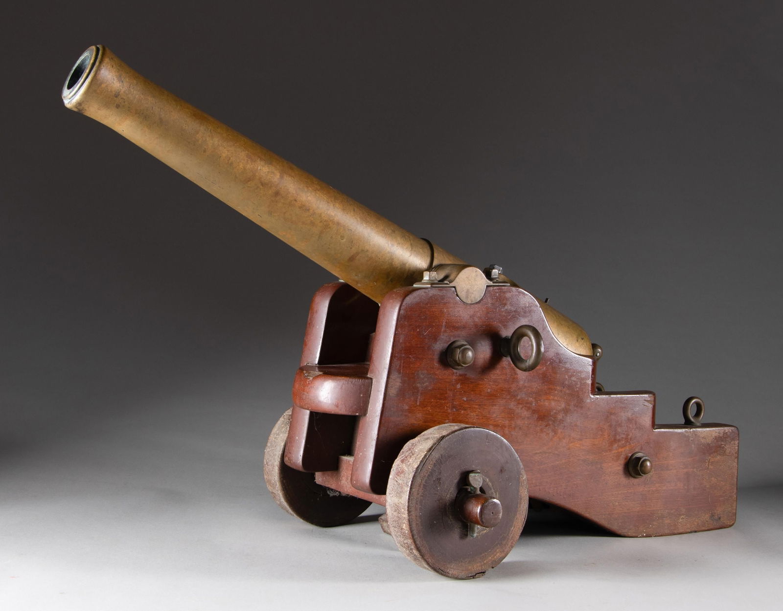 LARGE 100 POUND YATE'S PATENT BRASS BREECHLOADING: SALUTE CANNON. Cal. 1 7/8" w/ 10 Ga. insert. S# 10. Bbl. 26.5"; 1.52" diameter at muzzle. Mfg. by South Boston Ironworks of Boston, Mass; Patent date of June 8, 1881 above chamber. Clam shell two