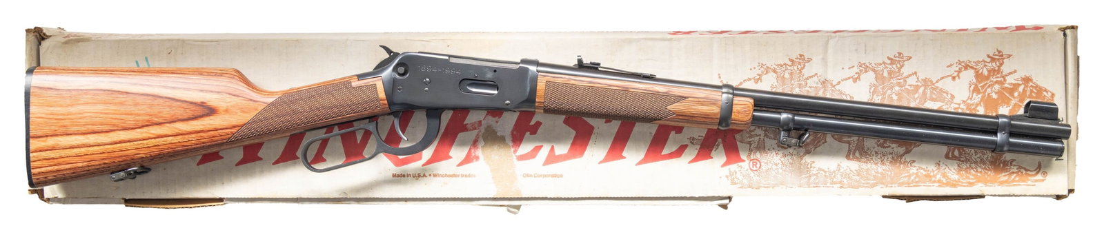NEAR NEW WINCHESTER MODEL 94AE "WIN-TUFF" 100TH: ANNIVERSARY LEVER ACTION RIFLE WITH MATCHING FACTORY BOX. Cal. 30-30. S# 6106141. Bbl. 20". Model 94AE "Win-Tuff" lever action rifle mfg. by Winchester commemorating 100 years of the prolific Model 94