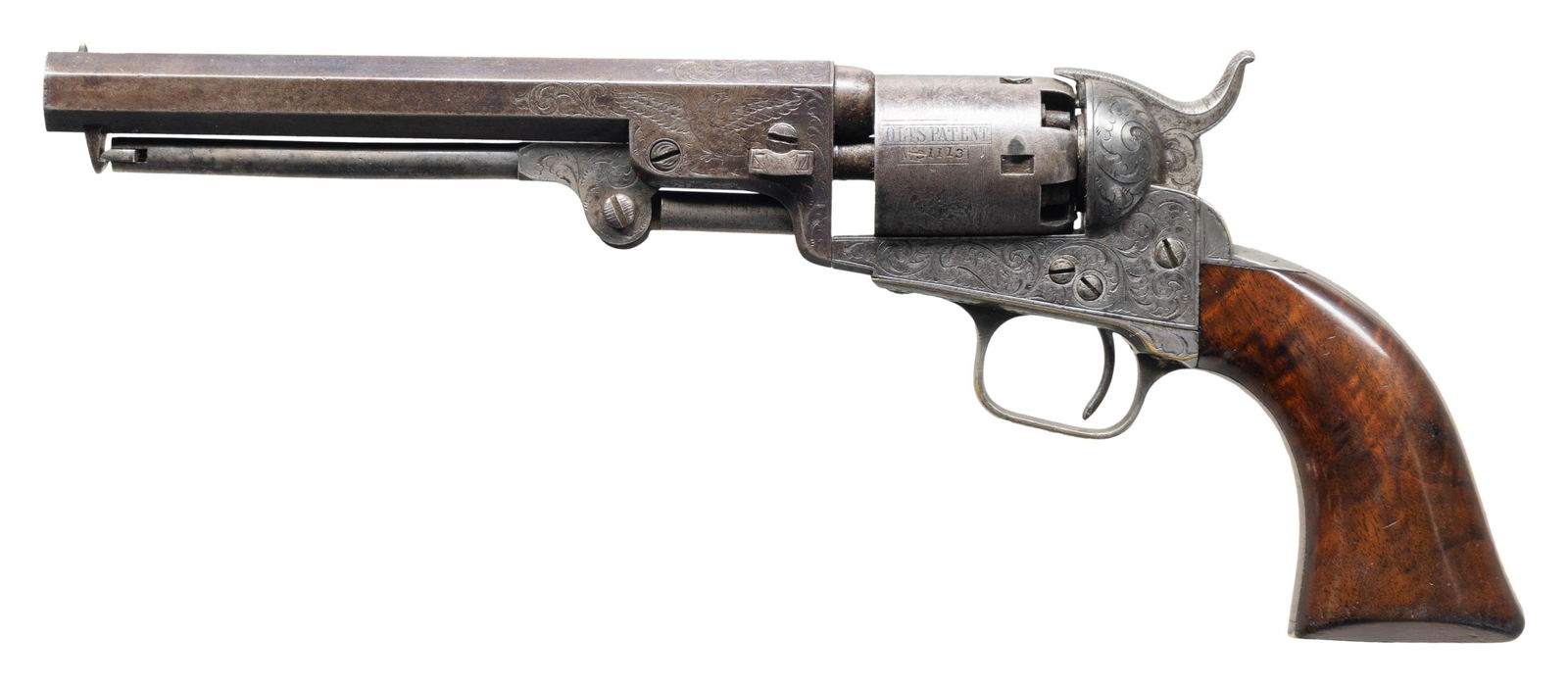EXTREMELY RARE DOUBLE PANEL SCENE FACTORY: EXHIBITION ENGRAVED COLT MODEL 1849 REVOLVER. Cal. 31. S# 31113. There are very few panel scene factory engraved percussion Colts extant, and double panel scene revolvers are true rarities. Unique