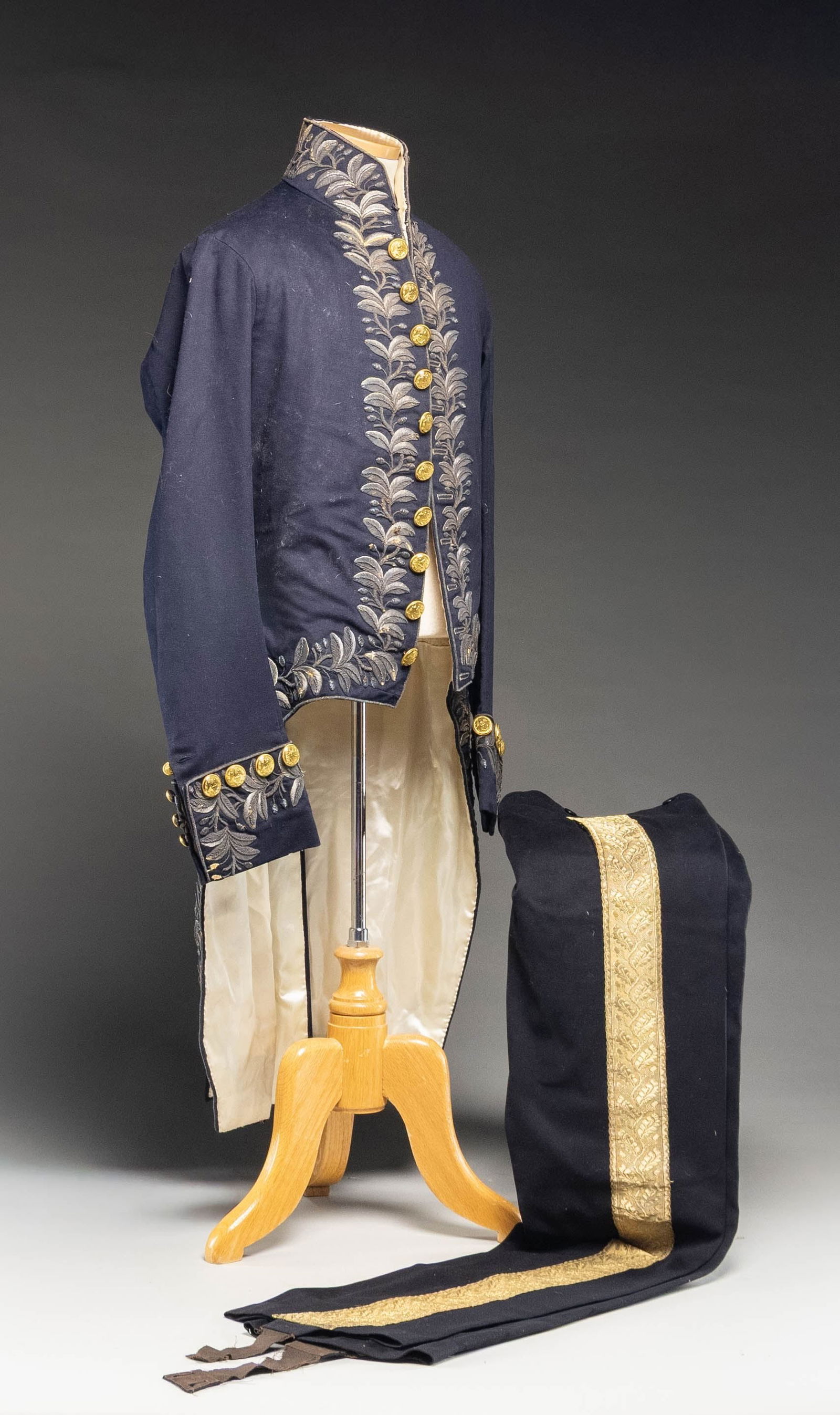 LATE FEDERAL PERIOD US DIPLOMATIC COAT & PANTS FOR: A NAVAL ATTACHE. This extraordinary fine quality dark blue wool frock coat and pants belonged to a naval officer serving in the diplomatic corps from the 1830s to the 1840s. Amazingly, the entire coll