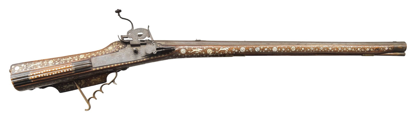 RICHLY DECORATED GERMANIC WHEELLOCK RIFLE.: Cal. 60. S# NSN. The 30-1/2" deeply swamped unmarked octagon barrel is fitted with small "V" notch rear sight and steel bead front. Barrel tang is fitted with peep rear sight with adjustment
