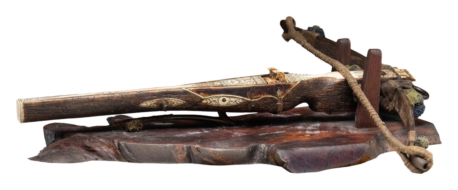 1600'S SAXON STYLE BONE INLAID HUNTING CROSSBOW: WITH STAND. Overall: 29.75". Steel prods measures 25.25" wide with 1/4" woven cloth string, 4 green & blue cloth dampers. Walnut stock held to bow by rope with a provision for iron loop at front.