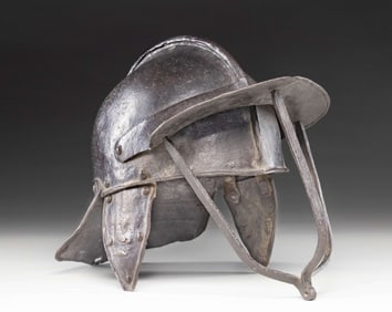 AN ENGLISH CROMWELLIAN PERIOD LOBSTERTAIL HELMET.