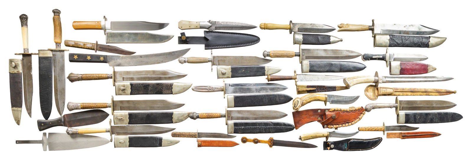 LARGE GROUP OF 20th CENTURY BOWIE KNIVES.: 26 knives total, most are copies of antebellum Sheffield knives with fake maker marks, a few are modern customs, and a few vintage, most have sheaths. CONDITION: very good to fine overall.