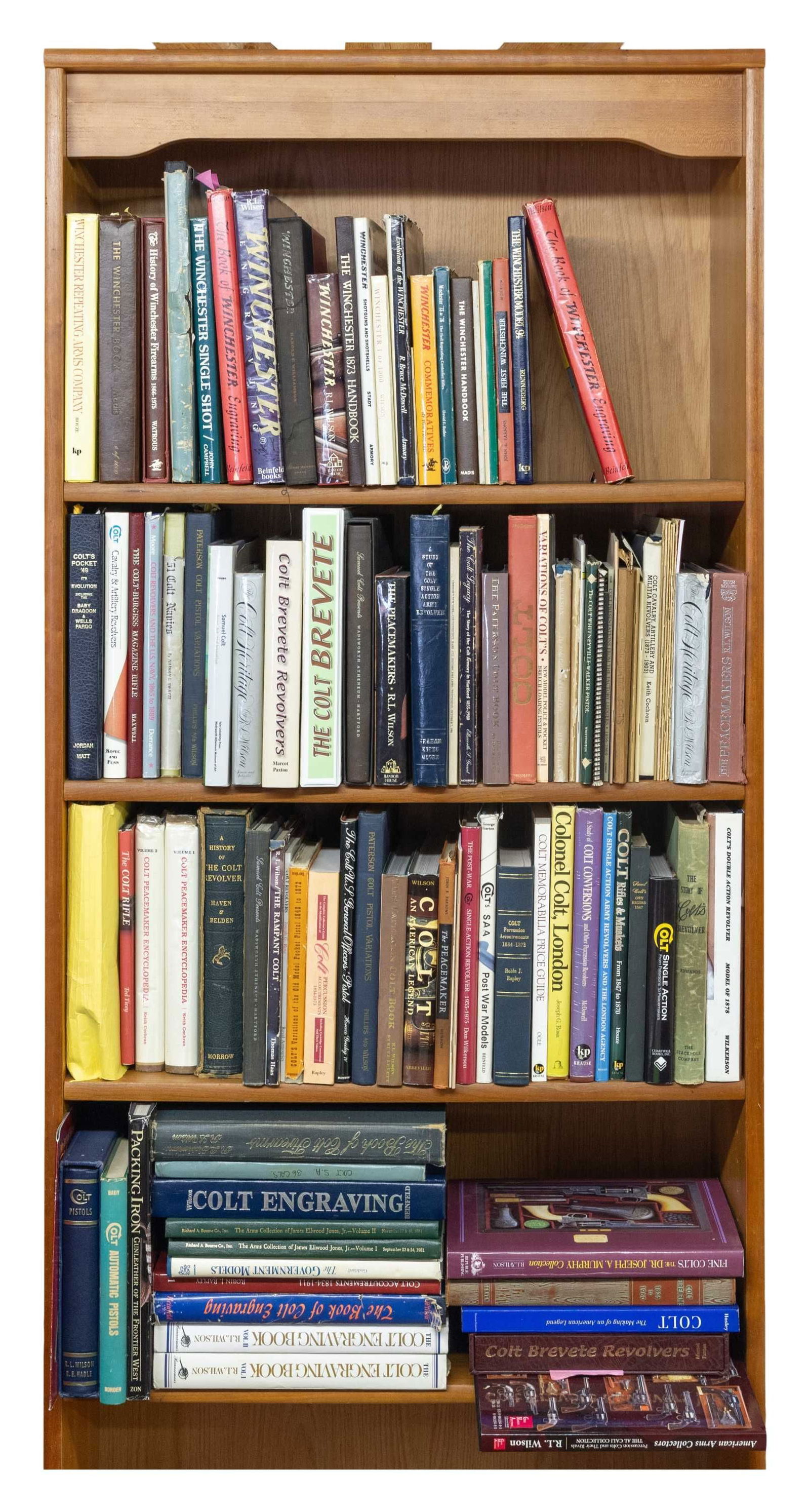 LARGE COLLECTION OF COLT & WINCHESTER REFERENCE: BOOKS. Over 100 of the best illustrated classics texts, also included is about 3" file of correspondence concerning Colts and about 50 Colt factory letters. (02-24521-7/JS). NON-GUN. $3,000-6,000.