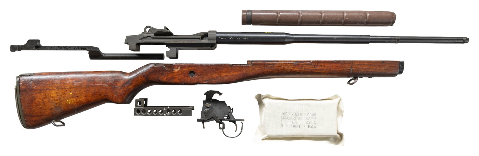 UNASSEMBLED SMITH ENTERPRISES M21 RECEIVER WITH: STOCK, & PARTS. Cal. 7.62mm. S# 002177. A barreled, otherwise unassembled Smith Enterprises M-21 receiver. Stamped "XM-25". Gray parkerized finish. Some lettering has been filled in white for ease of