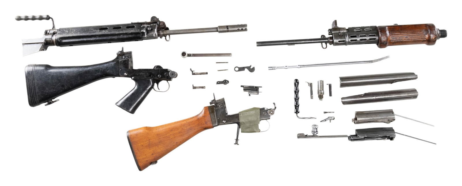 FAL MACHINE GUN PARTS KIT.: FAL machine gun parts kit consisting of: 1) x1 lower assembly. Selector is marked "S", "R", and "A". Metal components exhibit a black enamel finish. 1-piece plain black synthetic pistol grip and butts