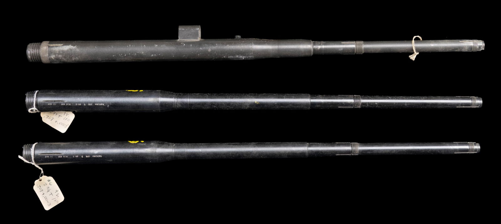 LOT OF THREE STRIPPED AFTERMARKET M14/M1A BARRELS.: This lot consists of the following 22" M14/M1A barrels: 1) Heavy profile bbl. marked only 1-12" for twist. Guide for op rod present. CONDITION: underside shows a large patch of moderate pitting, a