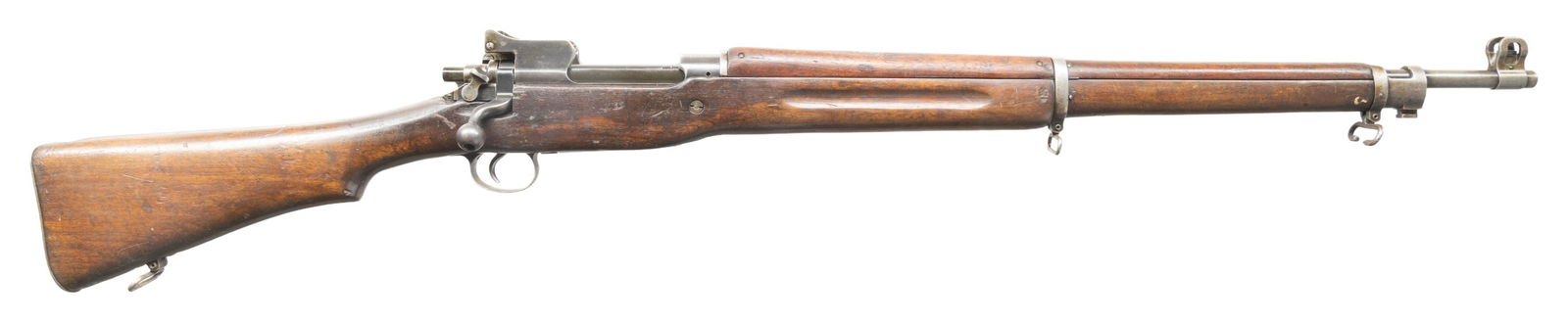 U.S. REMINGTON MODEL 1917 BOLT-ACTION MILITARY: RIFLE. Cal. 30-06. S# 471505. Bbl. 26". Barrel marked over front sight "R / flaming bomb / 7-18". Ladder rear sight graduated to 1,600 yards marked "R". Blade front sight with protective ears. Bolt