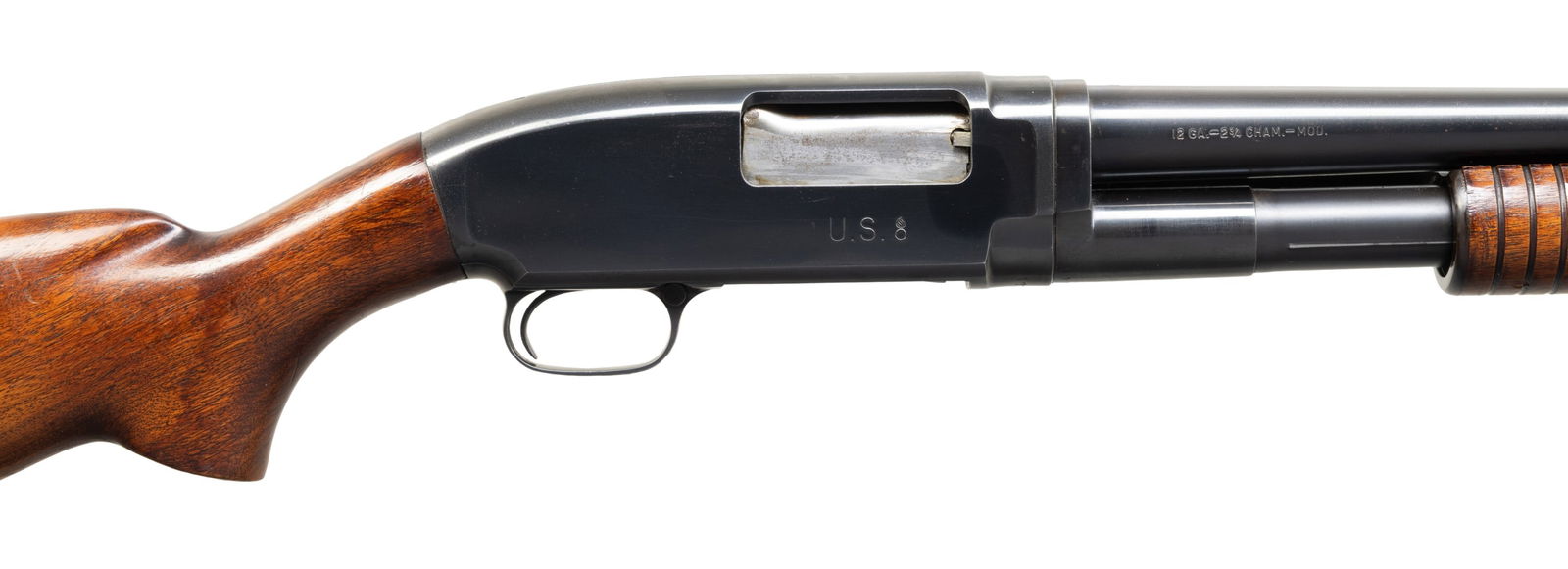 U.S. MARKED WINCHESTER MODEL 12 PUMP ACTION: SHOTGUN. Cal. 12 GA, 2 3/4". S# 1013973. Bbl. 28". Model 12 pump action shotgun mfg. by Winchester in 1946 under contract for the U.S. military. Right side of the bbl. is marked with the cal. designat