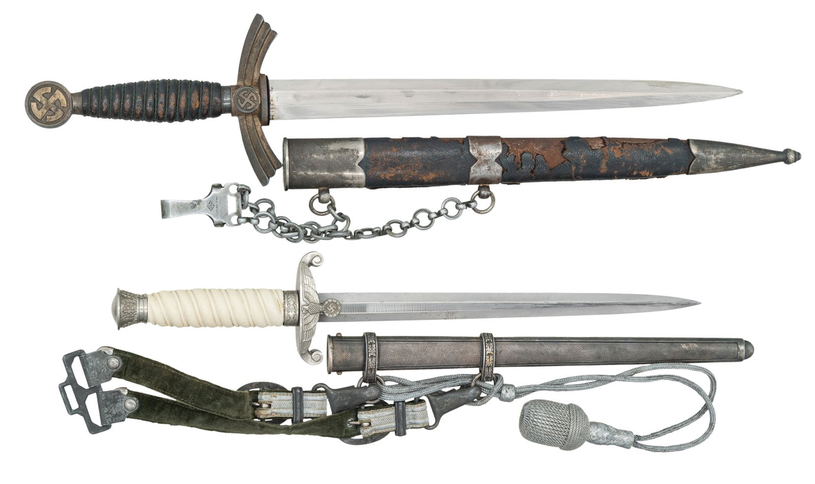 2 WWII GERMAN DAGGERS.: 1) A rough example of an original WWII German 1st model Luftwaffe dagger measuring 19 1/4"overall with a plain unmarked blade. Plated crossguard and pommel with gilded mobile Party symbol. Leather gri