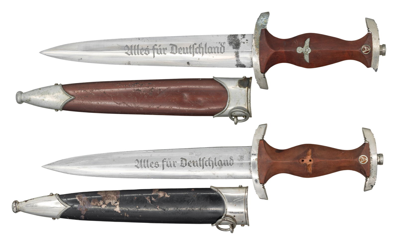 2 WWII GERMAN DAGGERS.: 1) WWII German NSKK dagger measuring 15" overall with a blade that is etched "Alles fur Deutschland" and is marked "RZM M7/51 1938 (logo)" which indicates manufacture by Anton Wingen Jr. of Solingen.