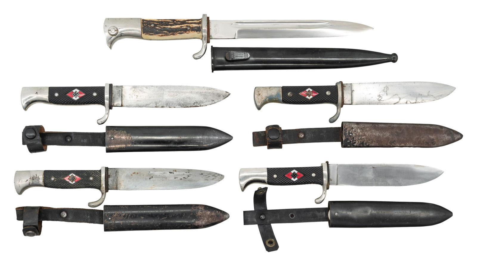 4 WWII GERMAN HJ KNIVES AND 1 DRESS BAYONET. (1 of 2)