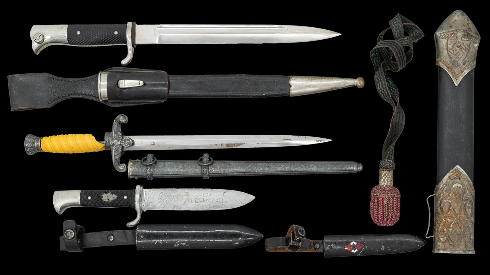 WWII GERMAN EDGED WEAPONS AND ASSOCIATED PARTS.: 1) WWII German HJ side knife measuring 10 1/4" overall with a blade etched "Blut und Ehre!" that is marked "(logo) PUMA SOLINGEN GES>GESCHUTZT". Plated hilt with stylized bird's head pommel. 2 piece b
