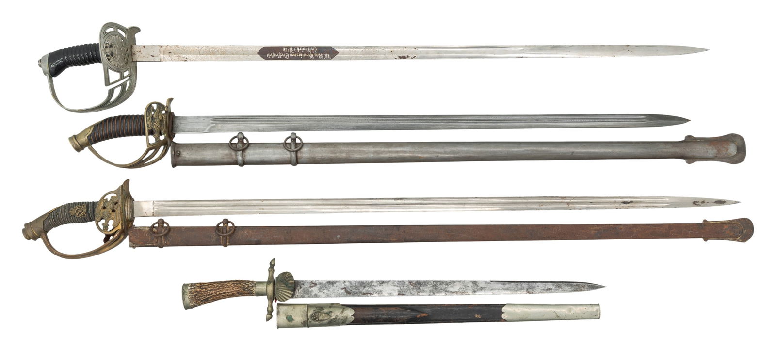 FOUR IMPERIAL GERMAN EDGED WEAPONS.: 1) Model 1899 Imperial German officer saber, nicely etched blade "W. Reg. Hennings von Treffenfeld / (Altmark) No. 16", black composite grip. 2) Model 1889 Prussian Infantry officer sword, Kaiser