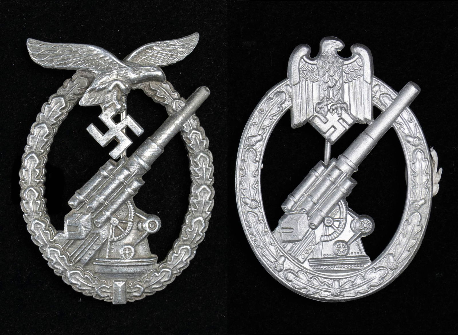 WWII GERMAN STYLE LUFTWAFFE & ARMY FLAK BADGES.: This lot contains 1 reproduction Luftwaffe flak badge that is slightly vaulted with a narrow pin and is marked "G. B." on the reverse, and 1 reproduction Army flak badge that is flat with a narrow pin