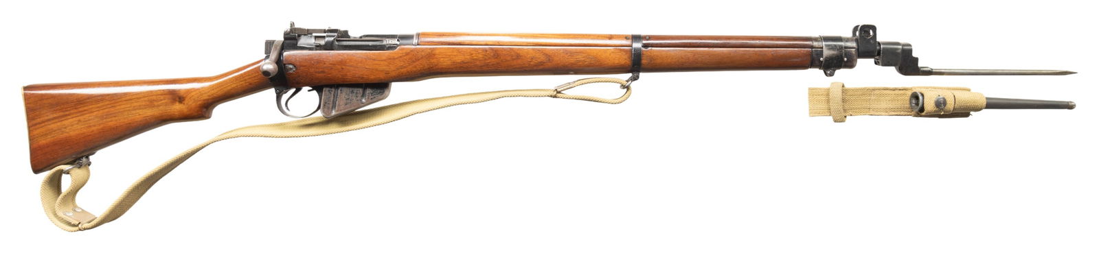 WW2 BRITISH NO.4 MKI BOLT ACTION RIFLE.: Cal. 303 Brit. S# BX10699. Bbl. 25 1/2". Blade front sight with protective ears. Ladder rear sight graduated to 1300yds. Matching numbers on left side of socket, receiver, mag & front of handguard tha