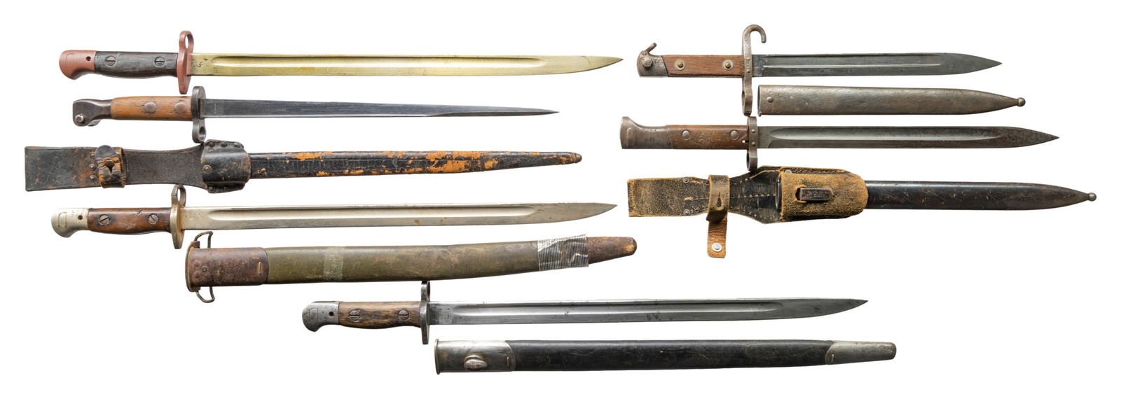 LOT OF 6 FOREIGN BAYONETS.: This lot consists of the following bayonets:1) British P1907 Bayonet. Blade has Wilkinson marking & 1-17 date. No scabbard present. CONDITION: blade has overall staining from old grease & scattered ox