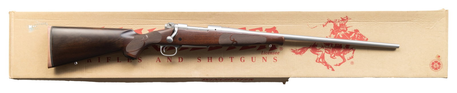 WINCHESTER MODEL 70 CLASSIC FEATHERWEIGHT SS BOLT: ACTION RIFLE. Cal. 25 WSSM. S# G3007351. Bbl. 22". Receiver is factory drilled & tapped for scope mounting. Featherweight Stainless Model 70 rifle. Checkered pistol grip walnut stock with bottom mount