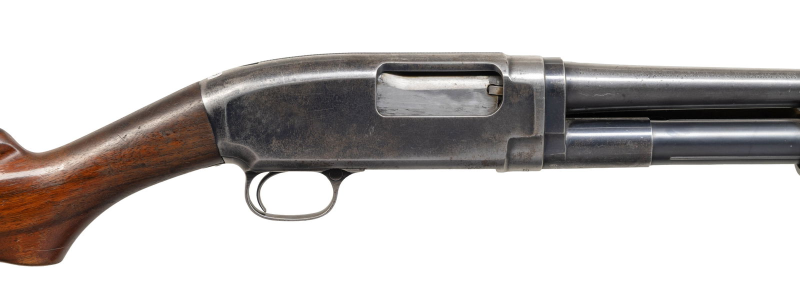 WINCHESTER MODEL 12 PUMP SHOTGUN.: Cal. 20 ga, 2 3/4". S# 576763. Bbl 28" of nickel steel with fixed full choke. Brass front bead. Small round grooved forearm and early style pistol grip stock with original hard rubber buttplate. Mfg.