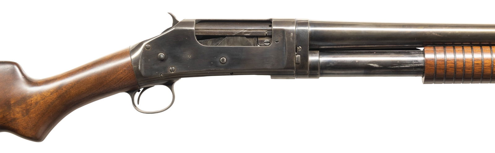 LOT OF 2 WINCHESTER MODEL 97 & 1897 PUMP ACTION: SHOTGUNS. 1) Cal. 12 GA, 2 3/4". S# E985256. Bbl. 20". Model 1897 pump action shotgun mfg. by Winchester in 1953 and later assembled in a trench configuration. Left side of the bbl. is marked with