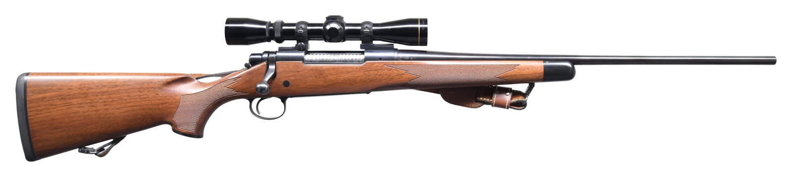 REMINGTON MODEL 700 BOLT ACTION MOUNTAIN RIFLE.: Cal. 280 Rem. S# B6860005. Bbl. 22" light taper sightless. Leopold Vari-X IIc 2-7 gloss finished scope w/ duplex reticle on 2 piece mounts. Classic cheekpiece satin finished walnut stock. Features inc