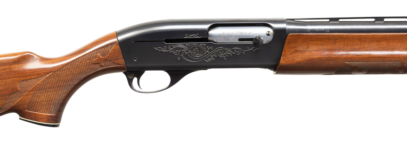 REMINGTON 1100 SEMI AUTO SHOTGUN.: CAL. 12 GA., 2 3/4". S# L447198V. Bbl. code "DU" appears to indicate Aug. 1971 mfg. VR 28" w/ steel bead & fixed "MOD" choke. Blued finish. Press checkered walnut stock set. CONDITION: near excellent