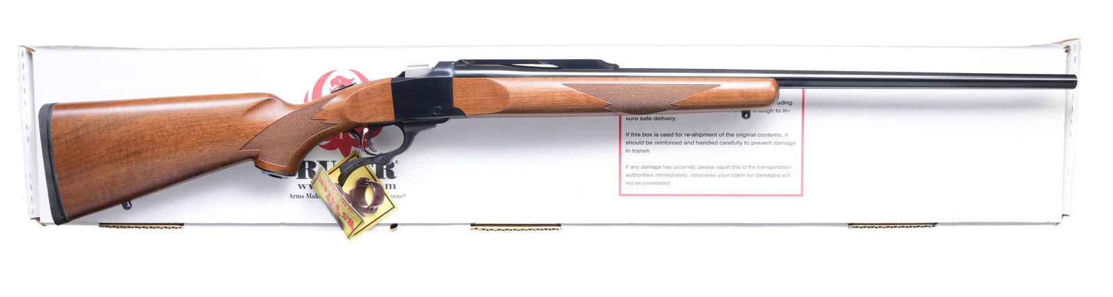 6.5 CREEDMOOR RUGER NO. 1-B SINGLE SHOT RIFLE WITH: MATCHING FACTORY BOX. Cal. 6.5 Creedmoor. S# 134-27696. Shipped 2010 as Model 11344. Blued finish with 26" barrel with quarter rib; no provisions for sights. Checkered walnut stock set w/ beavertail f