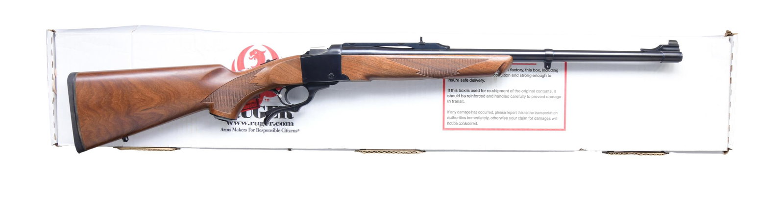 300 WIN MAG. RUGER NO. 1-S SINGLE SHOT RIFLE WITH: MATCHING BOX. Cal. 300 Win Mag. S# 132-33594. Mfg. 1982 as Model 11363. The rifle features a 22-inch blued barrel, equipped with a bead front sight and a flip-up rear sight on a quarter rib. The frame