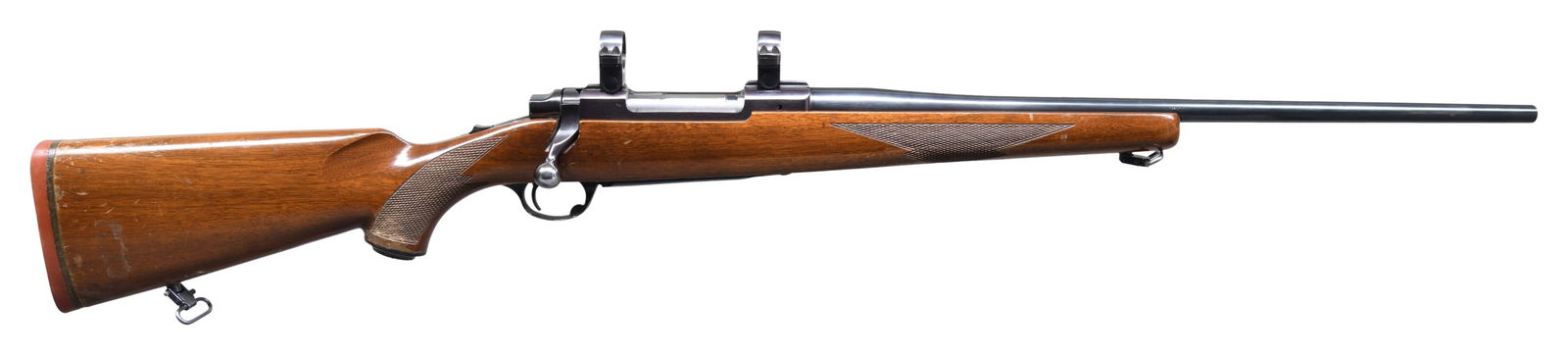 PRE-WARNING, 270 WIN. RUGER MODEL 77 BOLT ACTION: RIFLE. Cal. 270 Win. S# 72-62609. Mfg. 1977 as catalog # 77R. Bbl. 22" w/out sights. Ruger rings on integral bases. Long action w/ tang safety. Bolt has matching number & claw extractor. Checkered wal