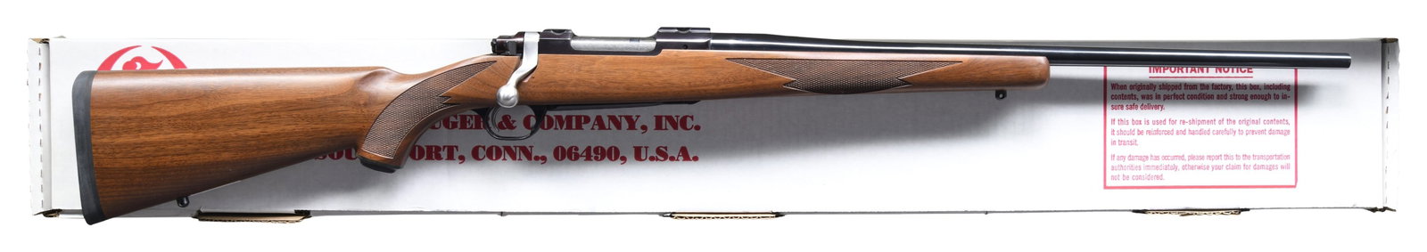 NEAR EXC., 260 REM. RUGER MODEL 77 MARK II BOLT: ACTION RIFLE WITH MATCHING FACTORY BOX. Cal. 260 Rem. S# 785-65724. Mfg. 1998 as Catalog # M77R MKII; Model 07985. Bbl. 24". Blued finish. Long action w/ integral ring grooves, claw extractor & matchi