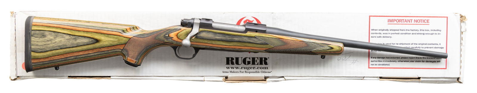 RUGER MODEL 77 HAWKEYE COMPACT BOLT ACTION RIFLE.: Cal. 243 Win. S# 710-88615. Bbl. 16 1/2" lightweight without provision for sights. Mfg. 2009 (2006 to date for all Hawkeyes) as Davidson's Distributors' exclusive with checkered laminated Green