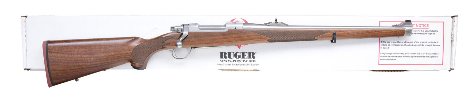 RUGER HAWKEYE INTERNATIONAL BOLT ACTION RIFLE WITH: MATCHING BOX. Cal. .243 Win. S# 712-46139. Shipped 2018 as Model 47193 & HM77R. The rifle features an 18.5-inch stainless steel barrel with a matching stainless steel receiver that includes integral