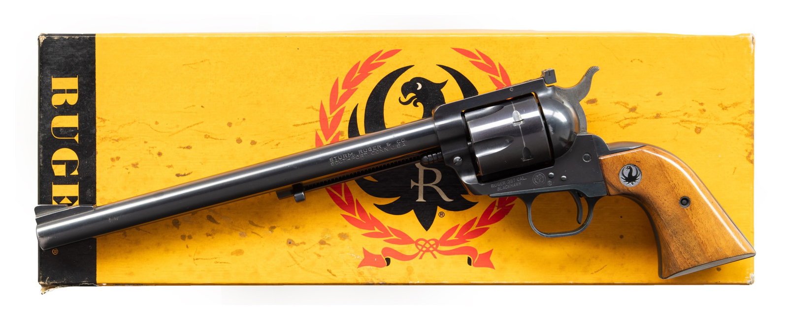 VERY RARE RUGER 8 GROOVE 10" FLAT TOP .357 MAG.: BLACKHAWK REVOLVER. Cal. 357 Mag. S# 37526. Bbl. 10" with 8 groove rifling having ramped base and serrated blade front sight plus correct frame mounted Micro rear sight. Mfg. 1961 (1955-1962 for all F