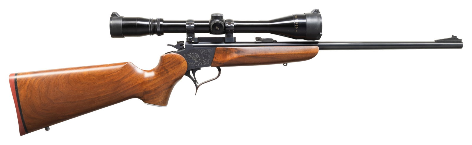 THOMPSON CENTER CONTENCER 22 HORNET SINGLE SHOT: CARBINE. Cal. 22 Hornet. S# 307553. Bbl. 21" Rochester marked with screw attached adjustable sights. Mfg. 1987 as blued Contender with easy open frame plus selector / safety on top of hammer. Redfield