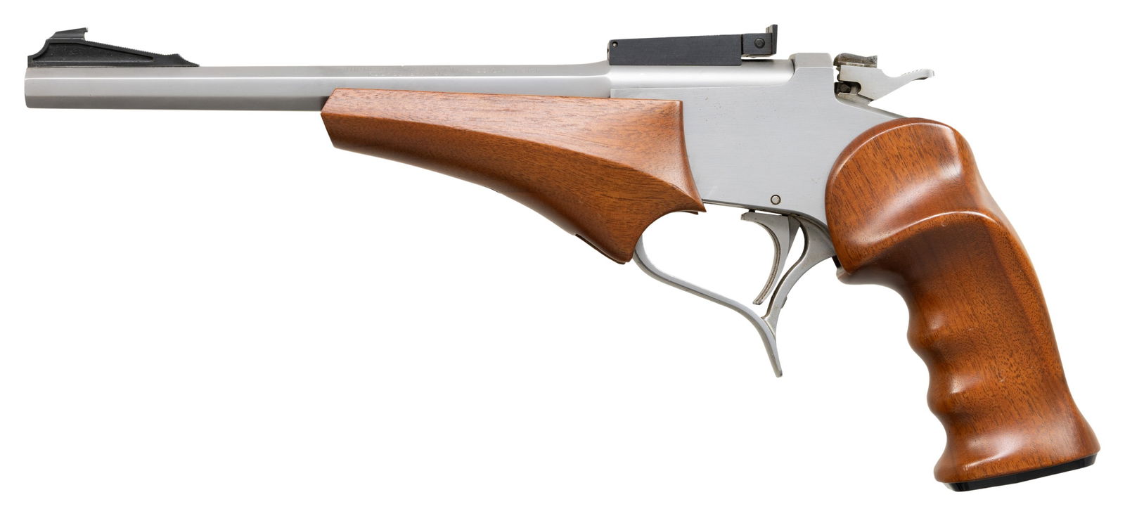 THOMPSON CENTER STAINLESS CONTENDER CUSTOM SHOP: "FLAT SIDE" SINGLE SHOT PISTOL. Cal. 22 LR. S# FRO S 1043. Bbl. 10" octagon stainless with fixed blued front sight and factory adjustable rear; marked "22 L.R. Match" having Rochester address plus