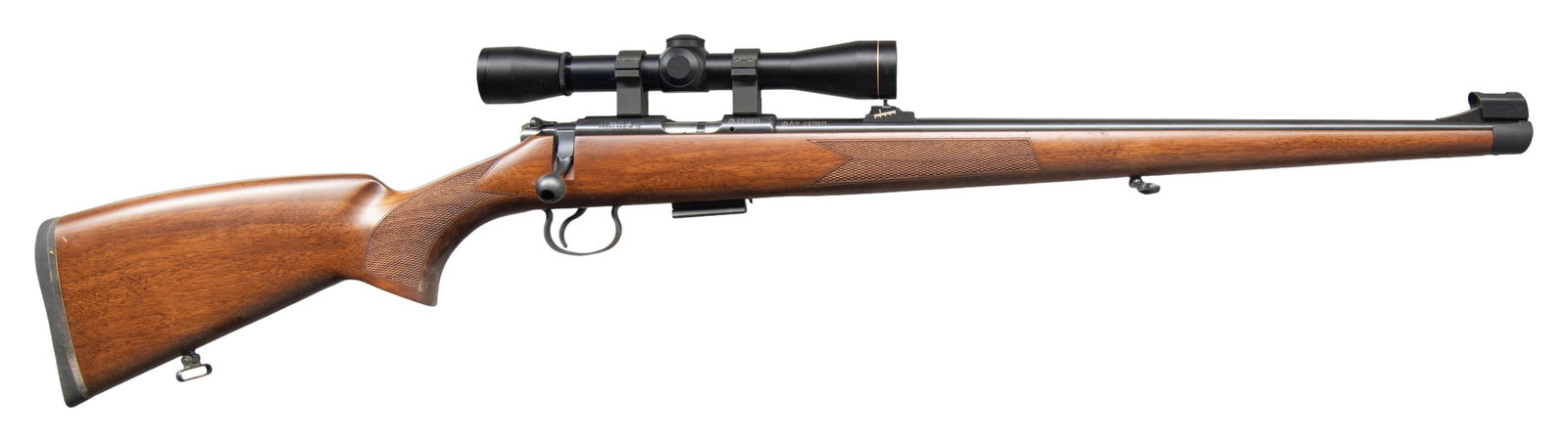 22 MAG. CZ 455 FS MANNLICHER BOLT ACTION RIFLE: WITH LEUPOLD SCOPE. Cal. 22 MAG. S# C211311. Mfg. 2017 in Czech Republic & imported by CZ-USA. Bbl. 20.5". Sporting iron sights. Leupold M8 4x duplex scope on tall rings. Full length checkered