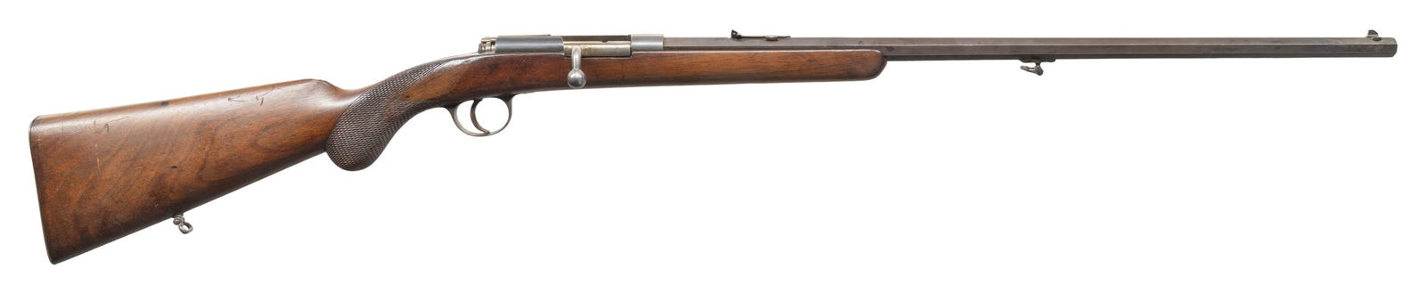 HUSQVARNA MODEL 25 BOLT ACTION RIFLE.: Cal. 7.65mm (32-20 WCF). S# 6324. Oct. 25.25" bbl. Sporting sights with added white paint. Mauser 1871 style action w/ wing safety. Checkered walnut stock w/ rnd. knob pistol grip & steel buttplate.